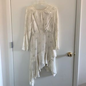 Creme asymmetrical dress with black stars